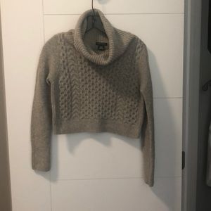 Cropped cable knit turtleneck
